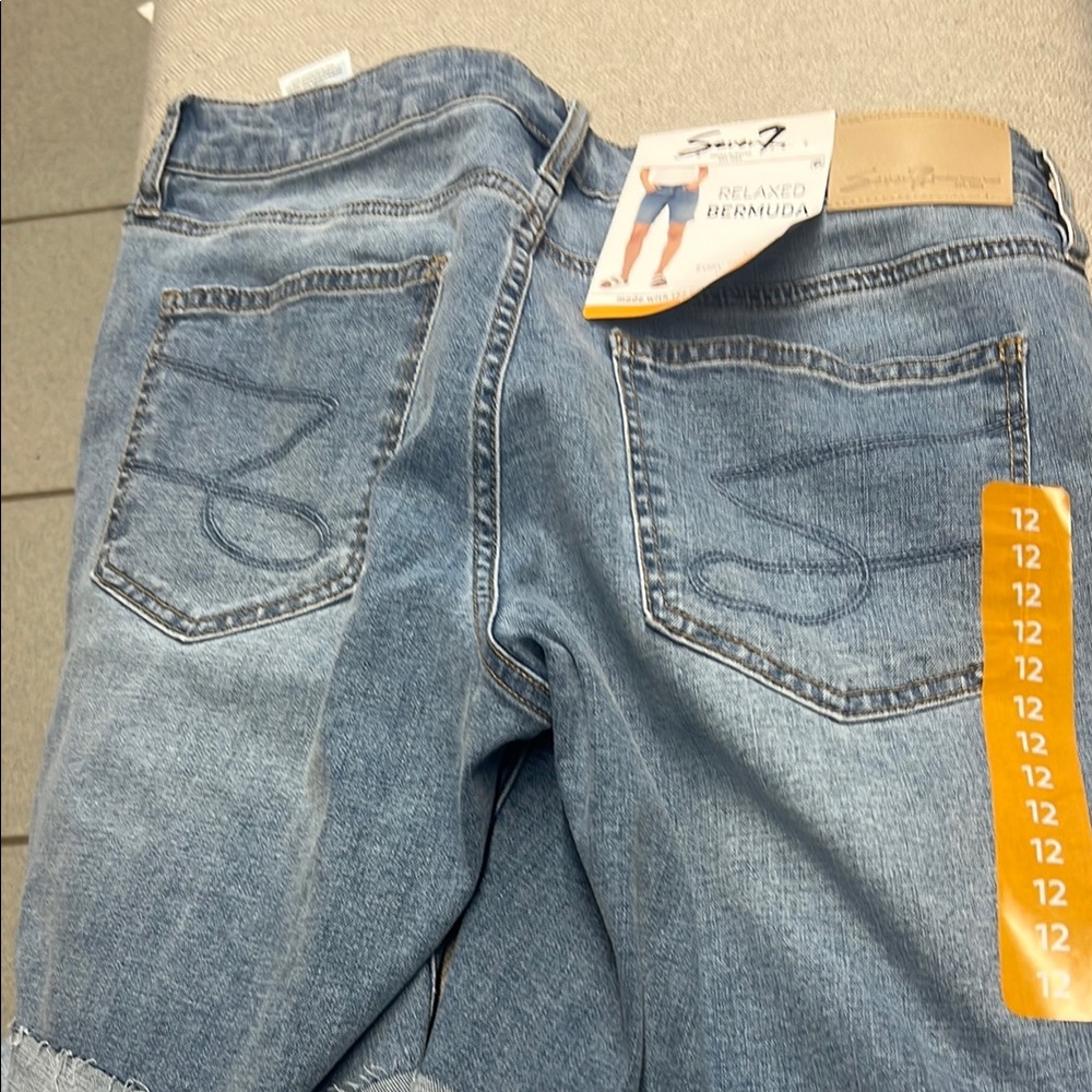 Women’s size 12 relax, Bermuda or light blue cuffed color Seven7